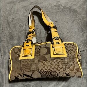 Yellow and tan Coach Purse